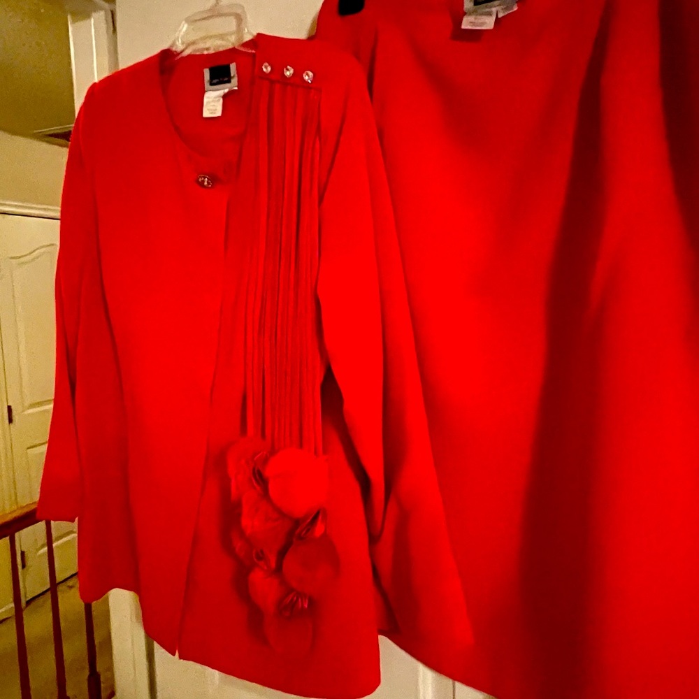 Red suit jacket and skirt only worn once .